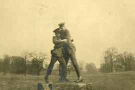 Two soldiers wrestling