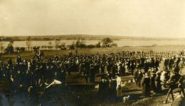 Crowd by water